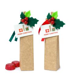 Caja pinza acebo con tarjeta Merry Christmas 2 bombones