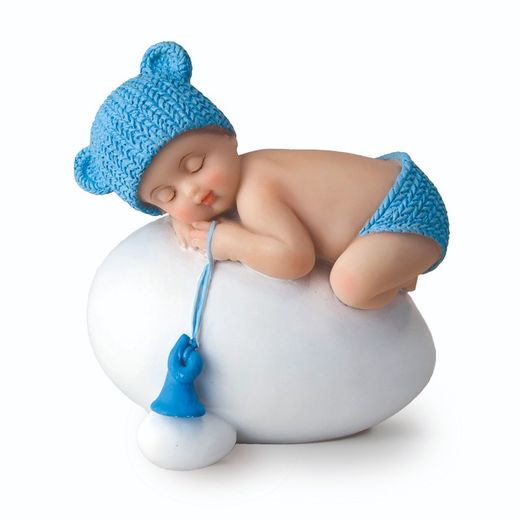 Figura niño bebé azul durmiendo sobre huevo,7,5x8cm. Figura para pastel bautizo