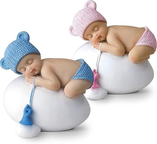 Figura niño bebé azul durmiendo sobre huevo,7,5x8cm. Figura para pastel bautizo